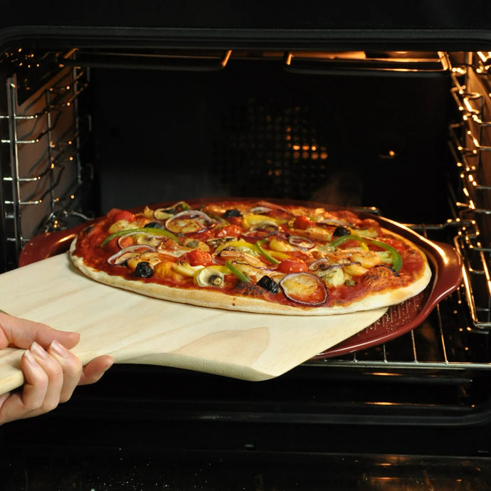 Pizza stone rainurée diam.35 cm avec rebord  - Emile Henry